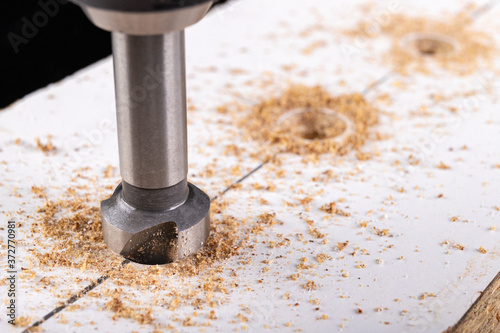 Metal countersink for making holes for screws. Minor jobs in the carpentry workshop.