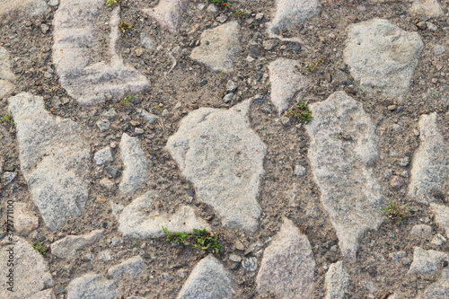 Road from granite stones as a background, Horizontal orientation