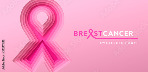 Breast Cancer month banner of papercut pink ribbon