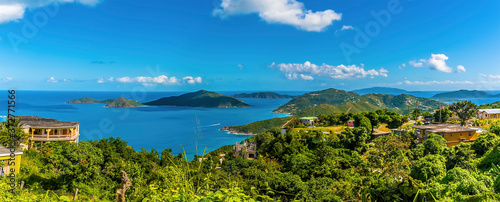 A panorama view from Ridge Road towards the islands of Guana, Great Camanoe and Scrub from the main island of Tortola photo