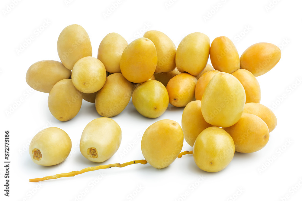 Fresh yellow dates fruits isolated on white background, clipping path included. Fresh yellow dates fruits isolated on white background, clipping path included.