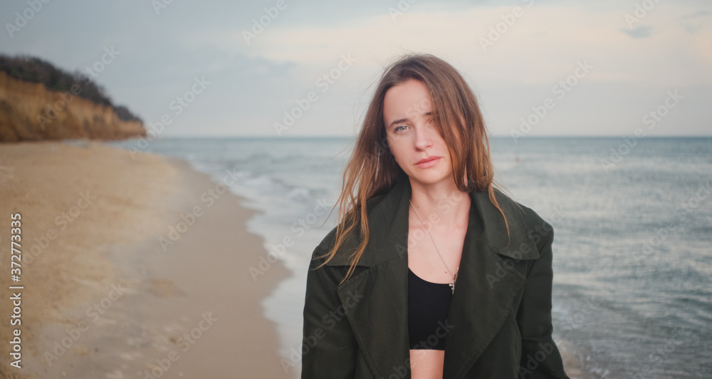 Incredible Fashion Girl Posing on a Sea Beach Incredible Fashion Girl Posing on a Sea Beach