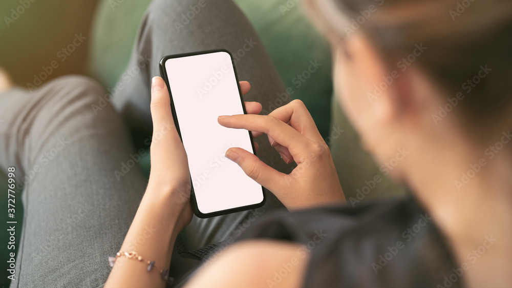 Young woman using mobile phone