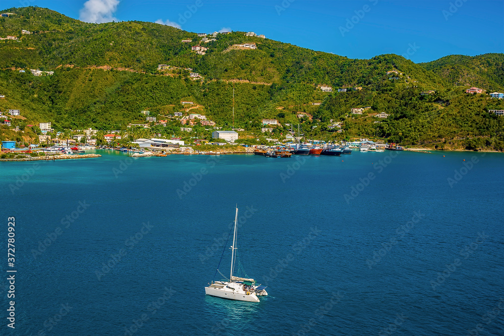 A catamaran sails gracefully towards Road Town Marina in Tortola A catamaran sails gracefully towards Road Town Marina in Tortola