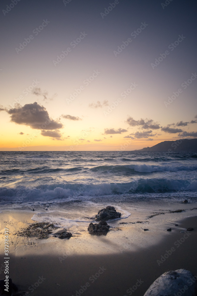 Naklejka premium Sardinia, Porto Paglia beach at sunset