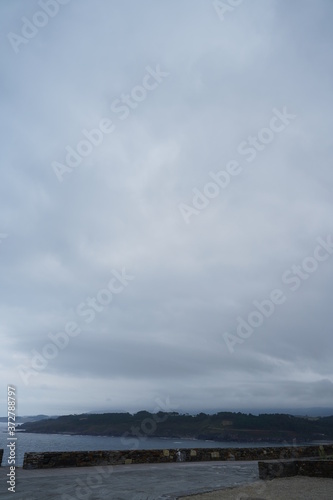 Ortiguera, village with lighthouse.Coast of Asturias,Spain.Aerial Drone Footage