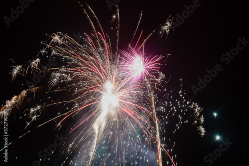 Long exposure of fireworks in the sky. photo