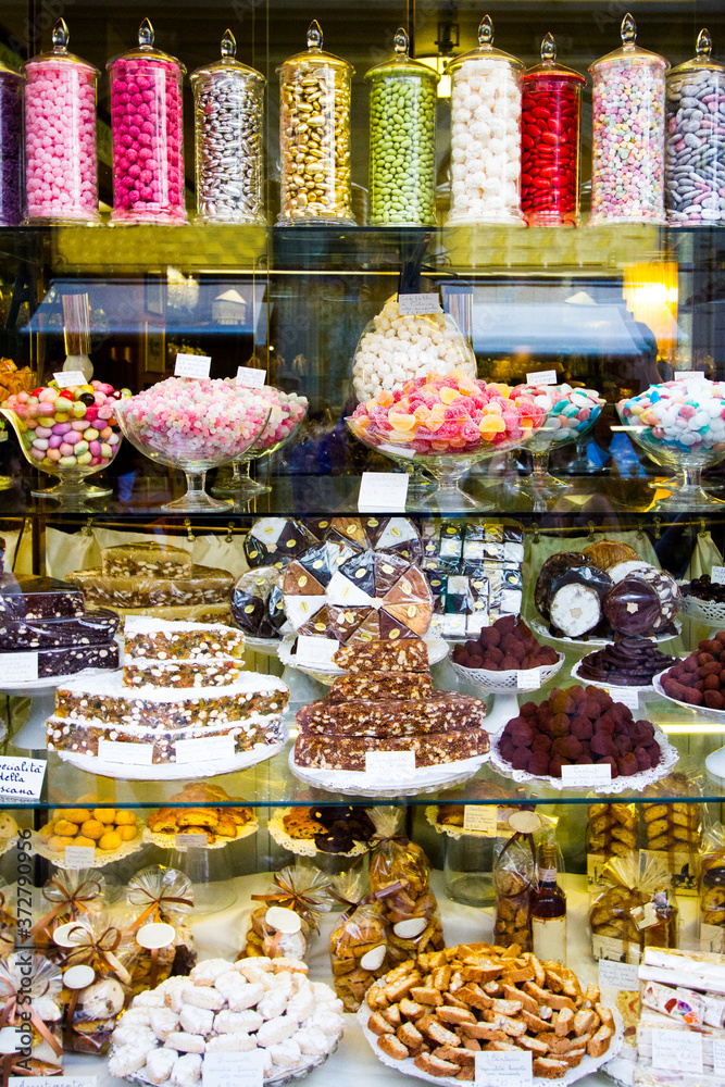 Candy Shop Window - A candy shop window beckons travelers to stop for a treat. Florence, Italy