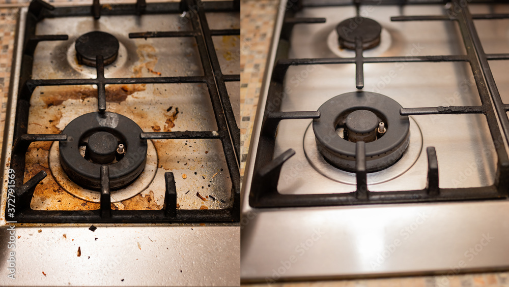 Dirty gas stove stained while cooking, a stove in grease. Unsanitary