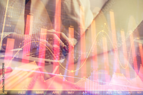 Wallpaper Mural Double exposure of woman hands typing on computer and financial graph hologram drawing. Stock market analysis concept. Torontodigital.ca