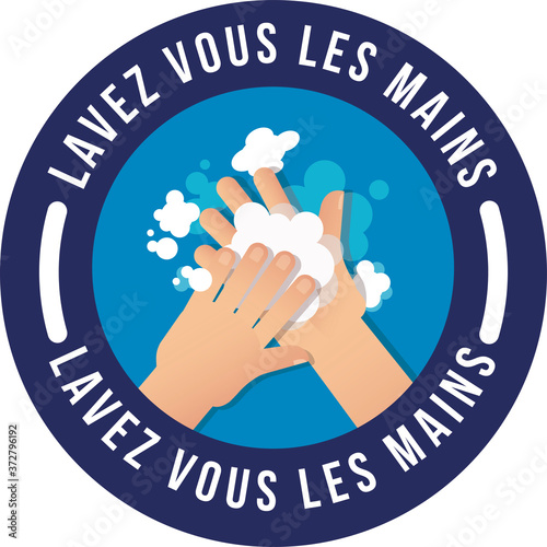 affiche pour "lavez-vous les mains" en blanc écrit dans un rond bleu foncé et au centre des mains se lavant avec du savon dans un fond bleu clair