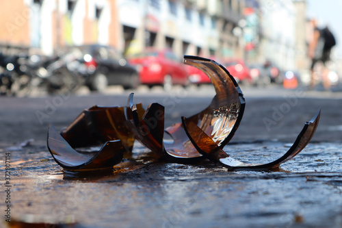 Smashed glass beer bottle in the floor in Mexican City