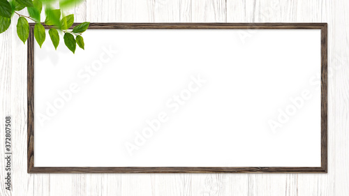 Picture frame hung on a white wooden wall