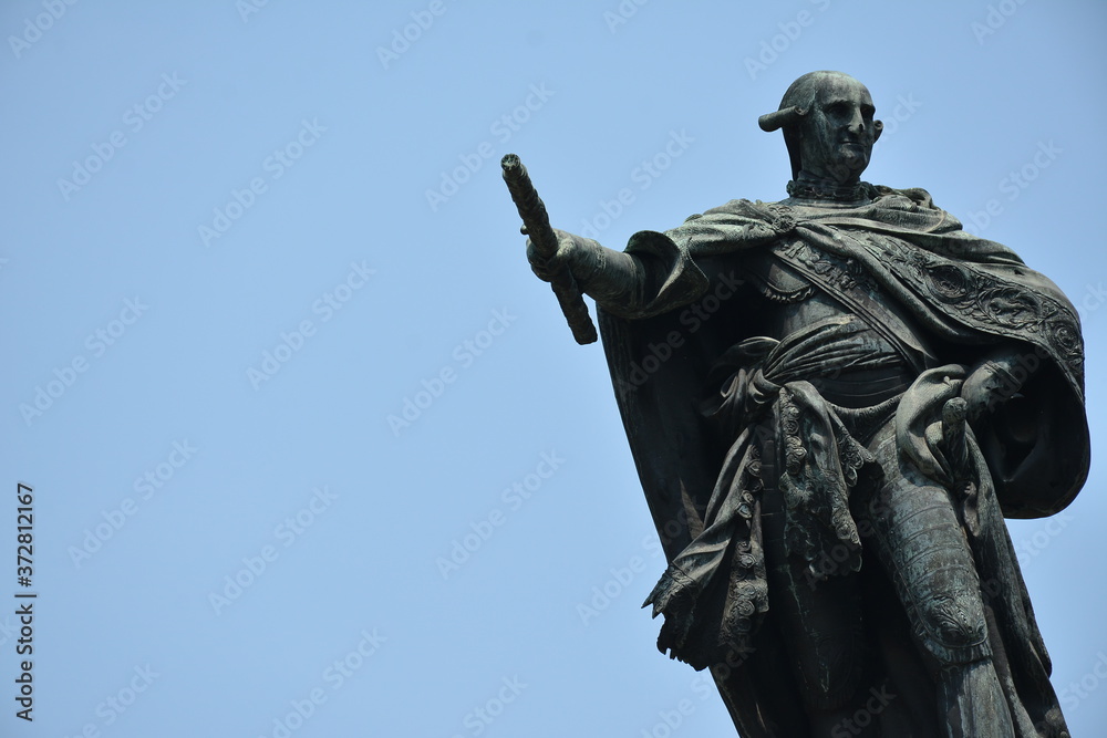 Obraz premium Al Rey D. Carlos IV monument at Plaza Roma, Intramuros in Manila, Philippines