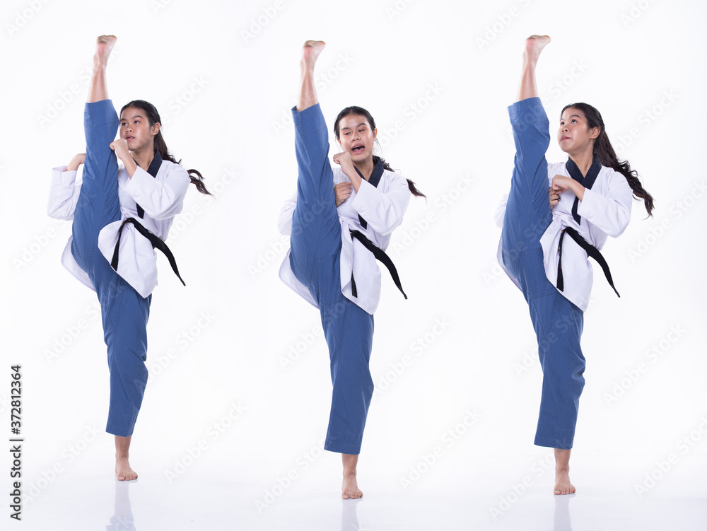 Fototapeta premium TaeKwonDo Karate national athlete kick punch on white background isolated