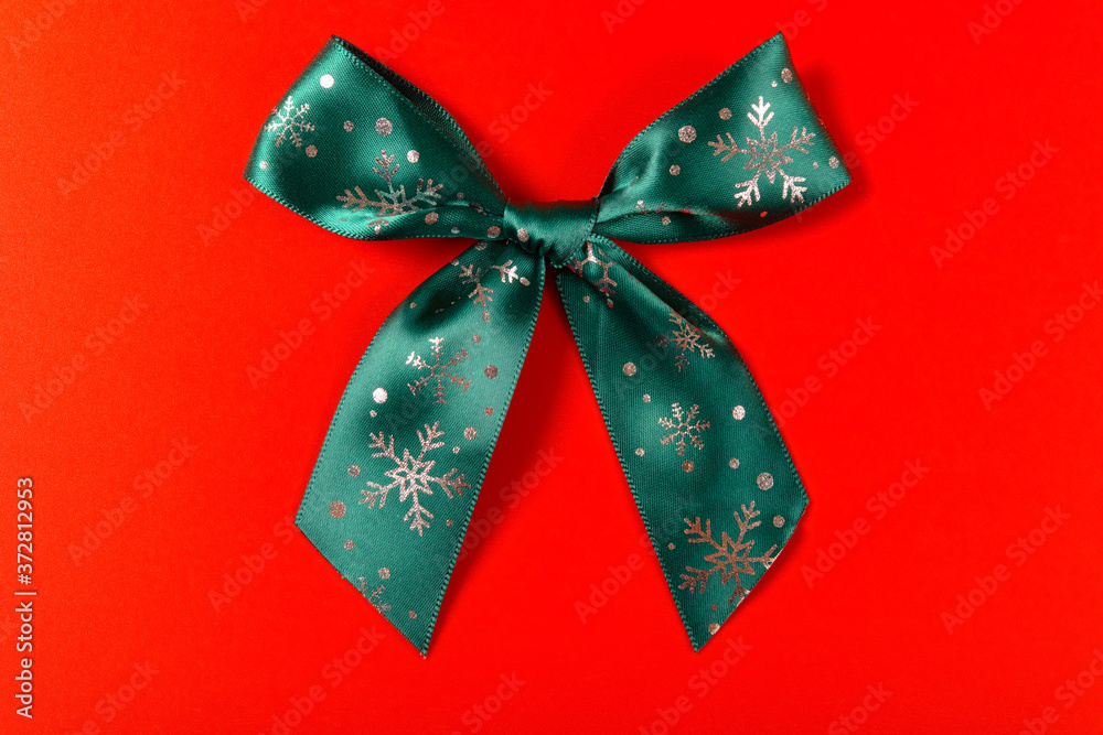 Christmas bow on a red background Christmas bow on a red background