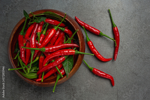 Red chilli paste on a black background.