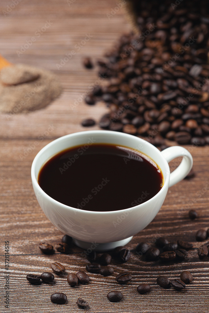 Coffee cups and beans, international coffee day concept Coffee cups and beans, international coffee day concept