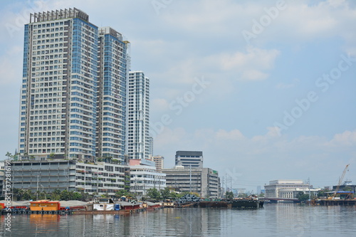 Neighboring buildings cityscape at Pasig river in Manila, Philippines © walterericsy