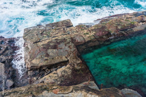 Bogey Hole Newcastle NSW Australia. Constructed by convict labor in Newcastle early colony times this rock pool is a famous landmark in the Harbor City