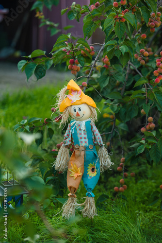 The garden scarecrow is beautiful.