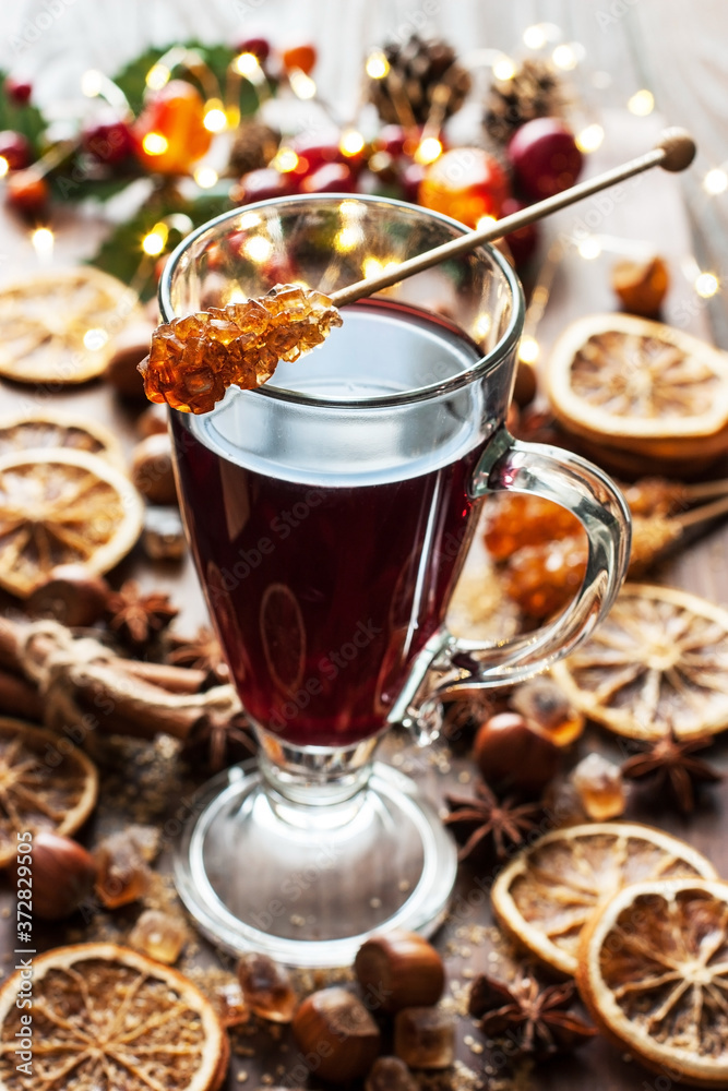 Mulled wine with citrus and cranberry. Christmas and winter warming beverage Mulled wine with citrus and cranberry. Christmas and winter warming beverage