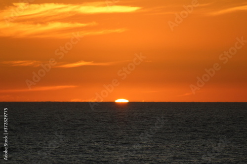 sunset over the sea © Kevin