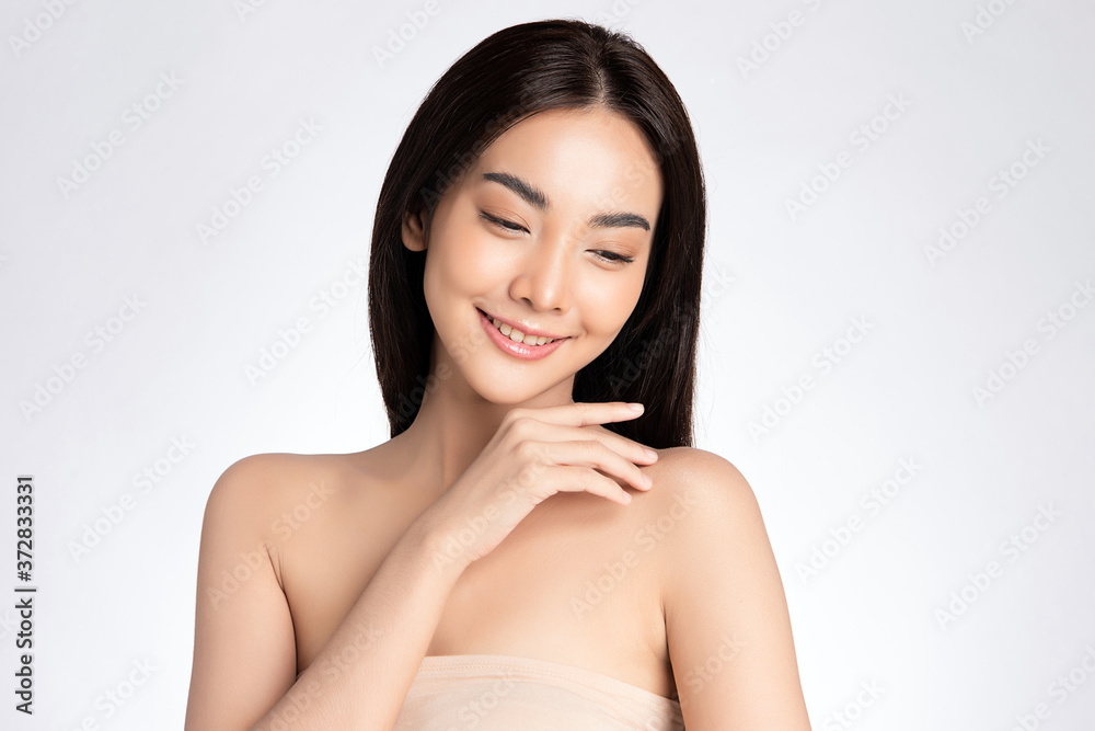 Beautiful Young asian Woman with Clean Fresh Skin, on white background, Face care, Facial treatment, Cosmetology, beauty and spa, Asian women portrait Beautiful Young asian Woman with Clean Fresh Skin, on white background, Face care, Facial treatment, Cosmetology, beauty and spa, Asian women portrait