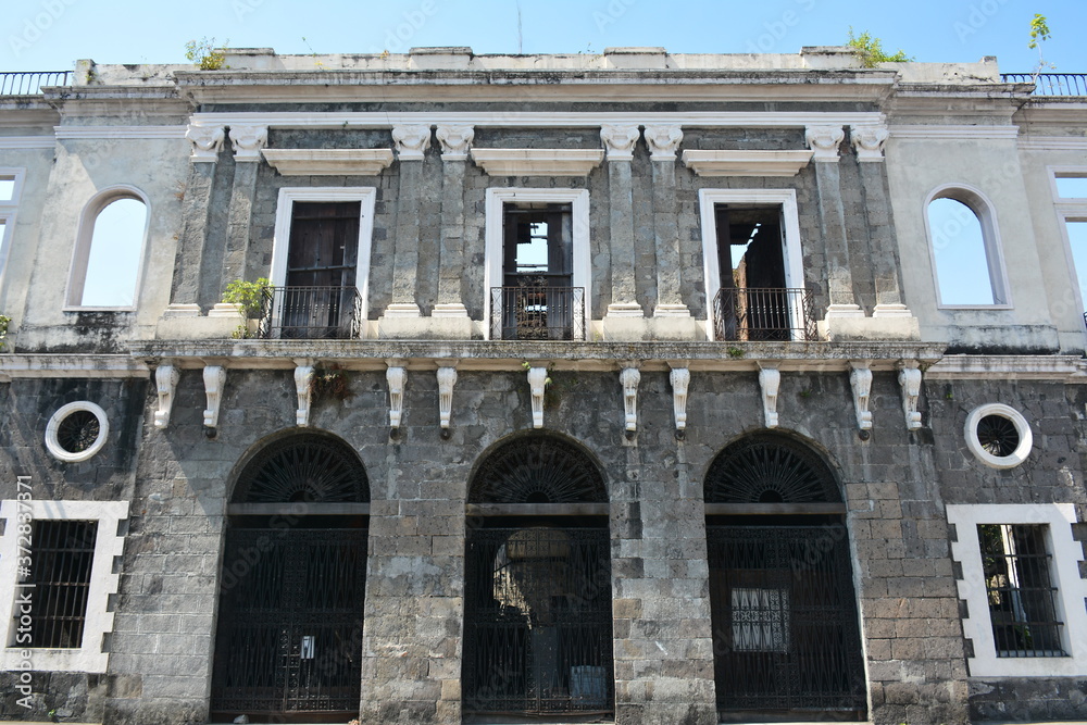 Aduana (customs house) abandoned building facade at Intramuros in Manila, Philippines