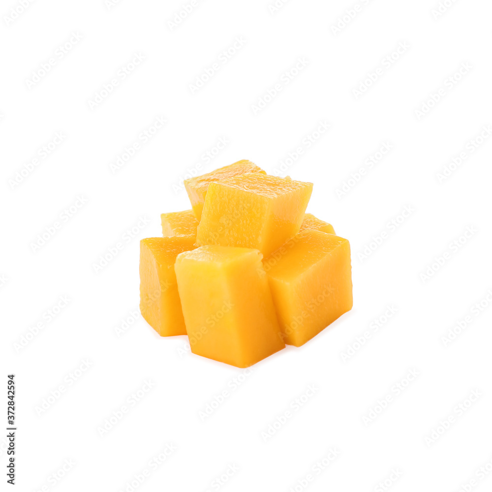 Cubes of ripe mango isolated on white. Exotic fruit Cubes of ripe mango isolated on white. Exotic fruit