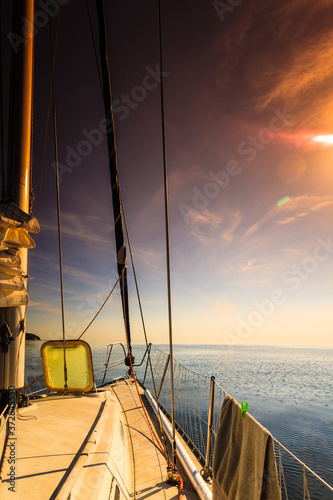 Fototapeta Naklejka Na Ścianę i Meble -  Yachting on sail boat during sunny weather