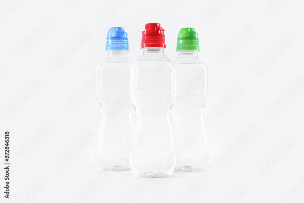 Plastic bottles with pure water on white background Plastic bottles with pure water on white background