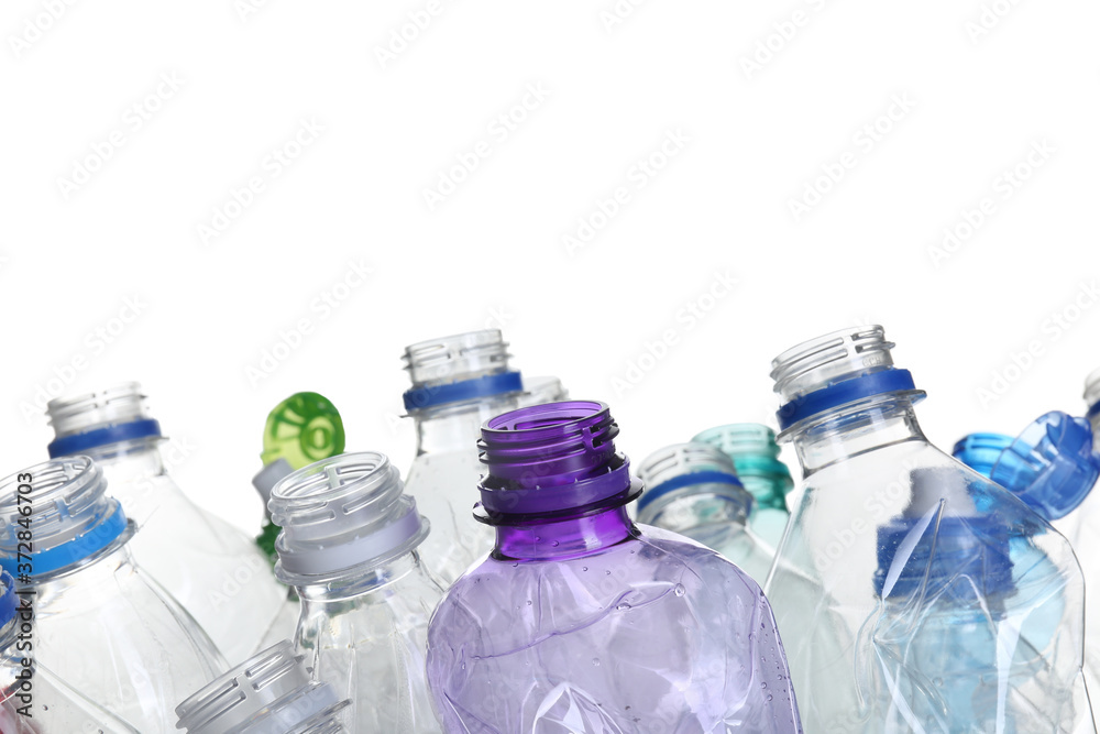 Pile of crumpled bottles on white background, closeup. Plastic recycling Pile of crumpled bottles on white background, closeup. Plastic recycling