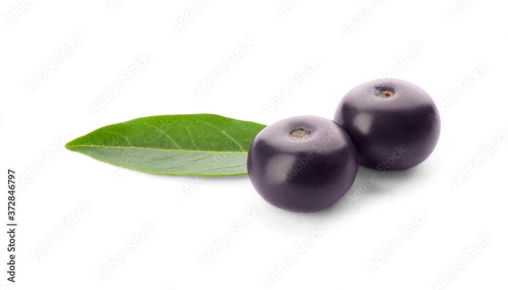 Fresh acai berries with leaf isolated on white Fresh acai berries with leaf isolated on white
