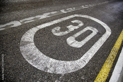 Thirty sign on the asphalt © esebene