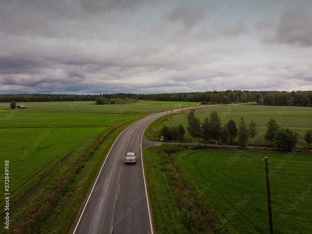 Fototapeta premium Driving Home Before The Storm