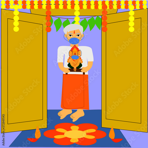  Ganesh Chaturthi festival, happy elder man holding Ganesh idol with wearing face mask.welcoming home during Ganeshotsav.  At the time of coronavirus, covid-19.  
