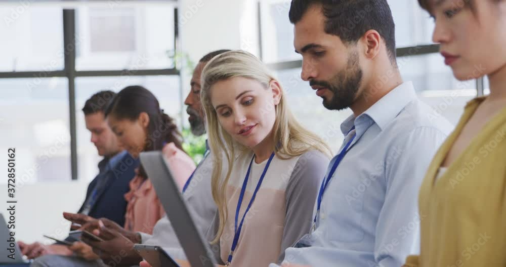 Business people attending to a meeting in conference room Business people attending to a meeting in conference room