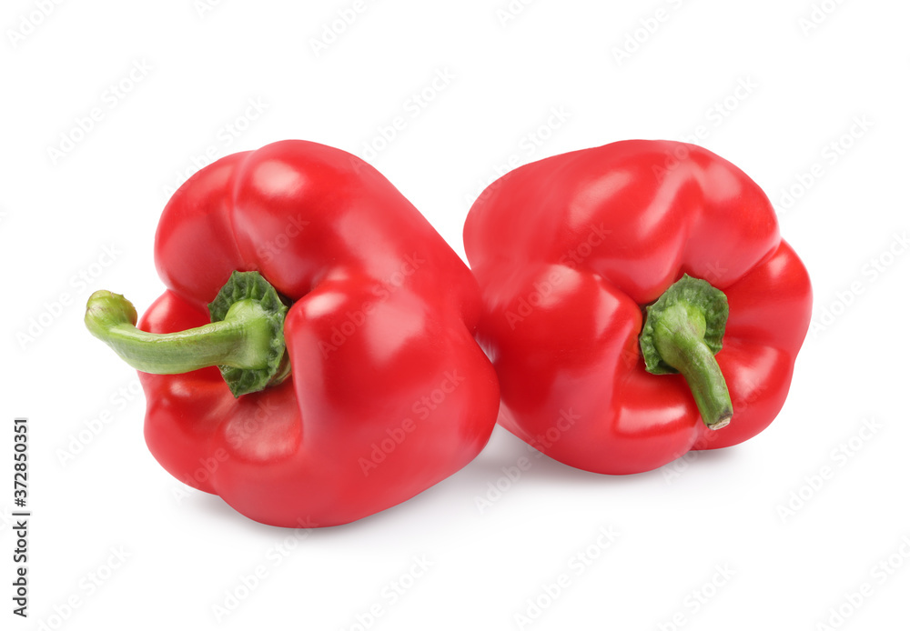 Ripe red bell peppers isolated on white