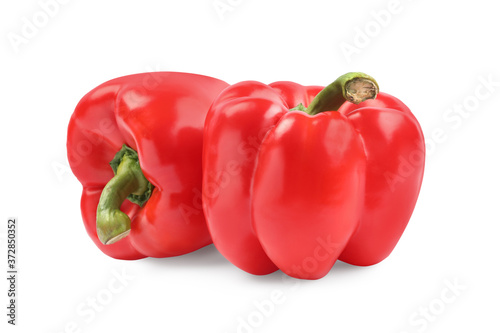 Ripe red bell peppers isolated on white