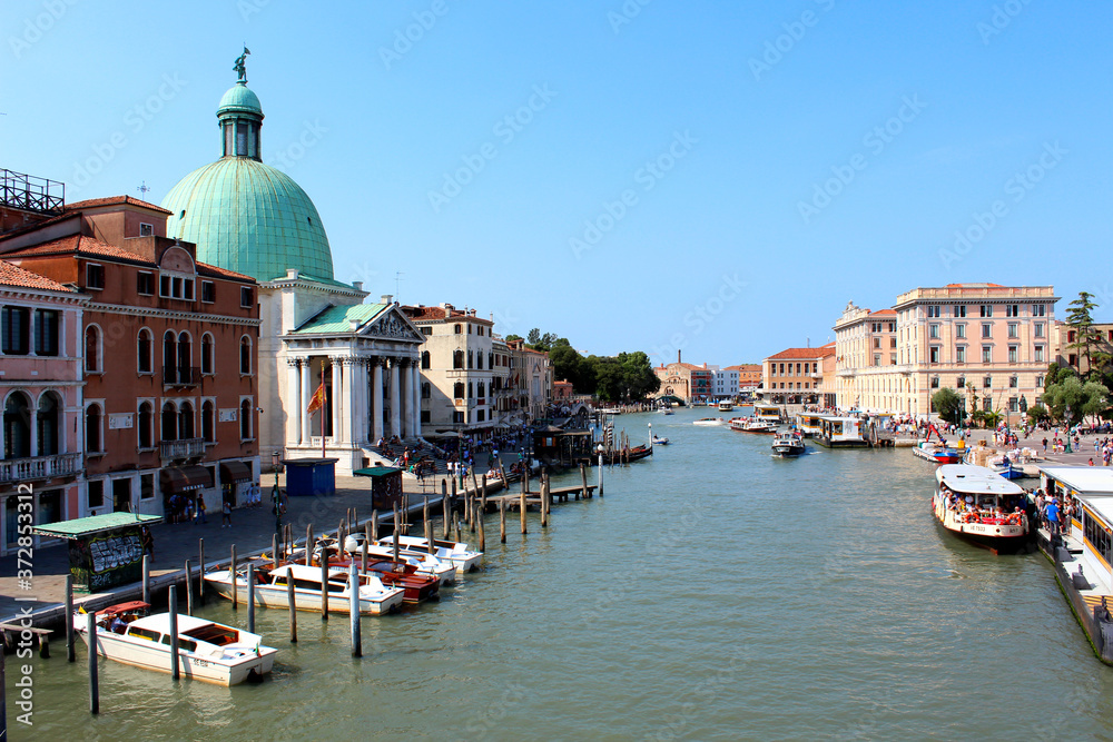 Panoramic view of the Grand Canal in Venice, Italy. Beautiful summer day with clear blue sky.