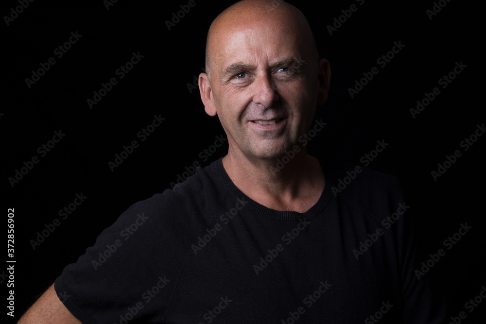 male self portrait with black background