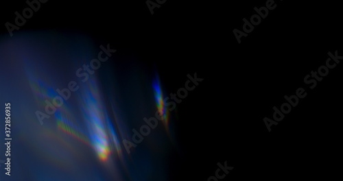 Prism Rainbow Light Flares Overlay on Black Background photo