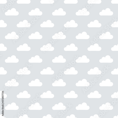 seamless repeat pattern design with clouds on a grey background