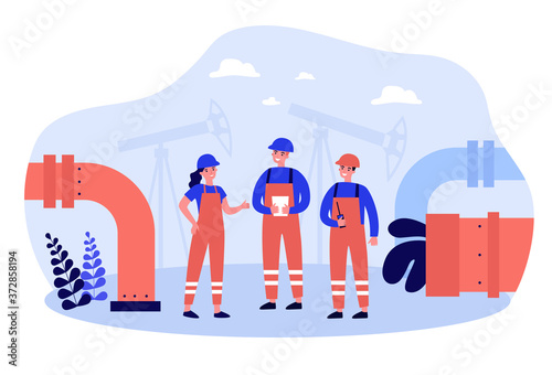Oil refinery engineers working on factory. People wearing helmets and overalls standing at petroleum pipes. For oil and gas industry, production, pipelines concept