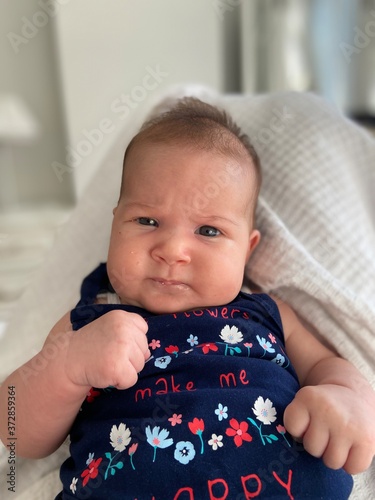 Angry baby girl face