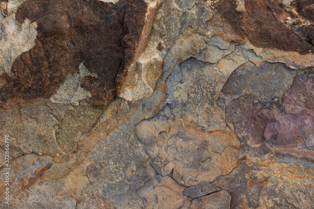 
Brown stone texture, sandy background