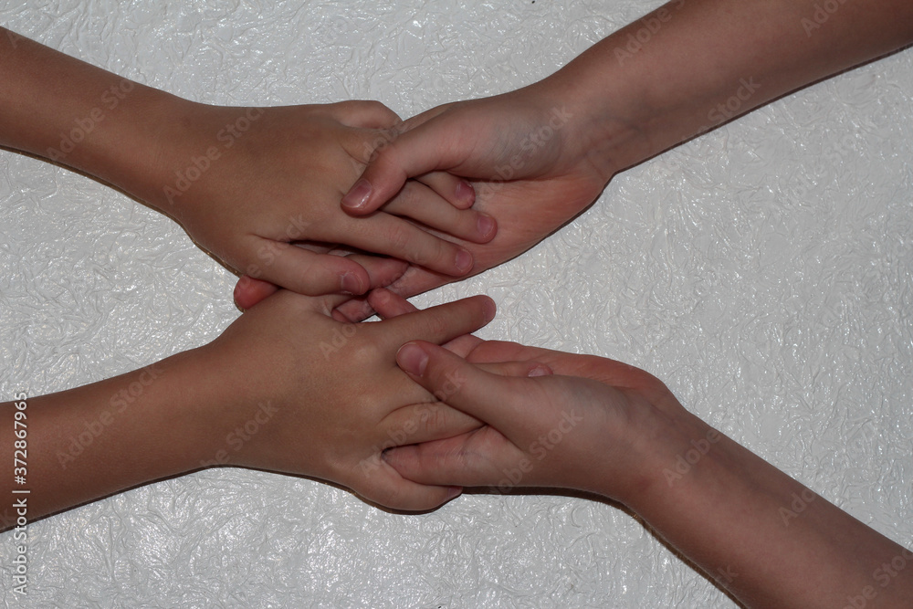 Kids hold hands. A symbol of support. Kids hold hands. A symbol of support.