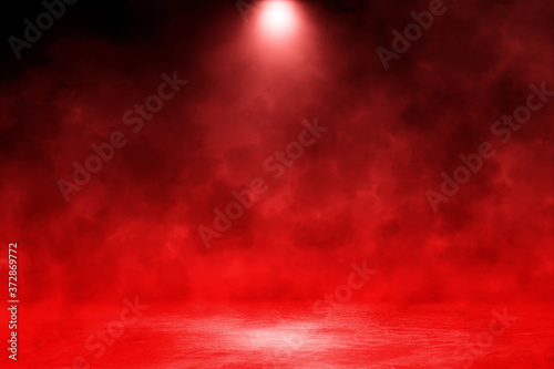 Empty space of Studio dark room with white fog and red lighting effect on concrete floor gradient background for interior decoration.