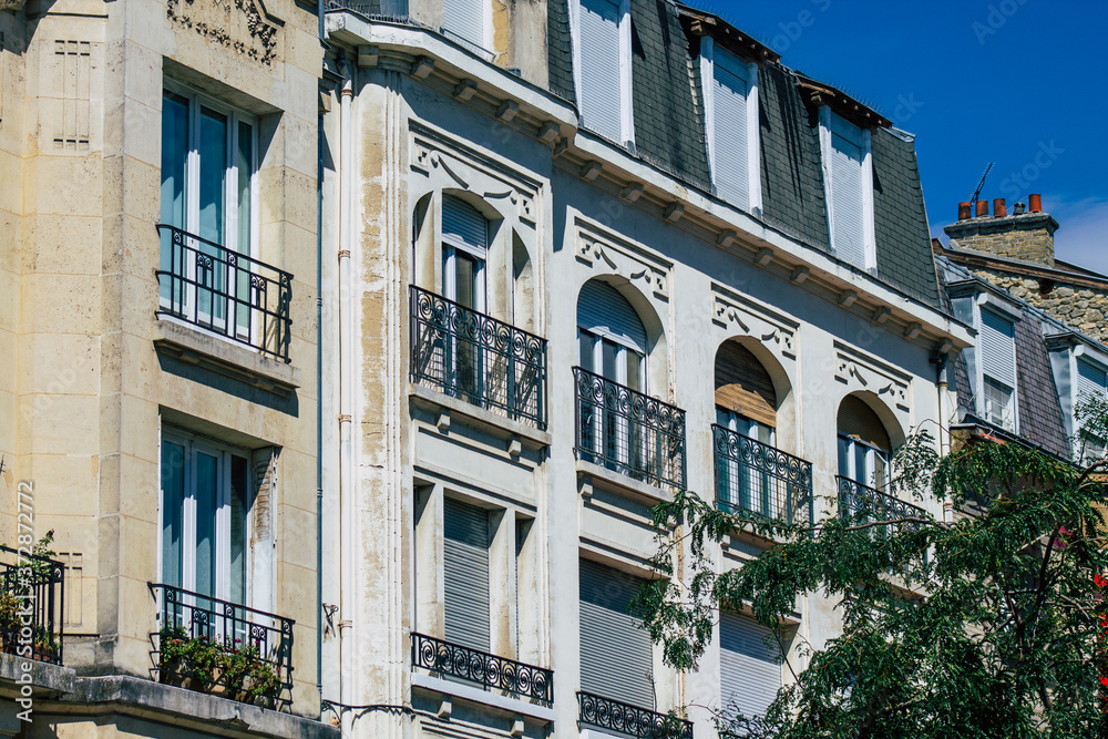 Naklejka premium View of the facade of a historical building located in Reims, a city in the Grand Est region of France and one of the oldest in Europe